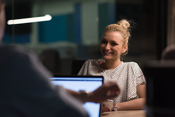 Image showing Multiethnic startup business team in night office