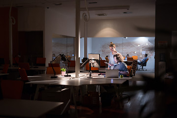 Image showing young designers in the night office