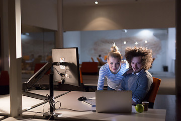 Image showing young designers in the night office