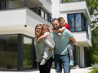 Image showing happy family with children in the yard