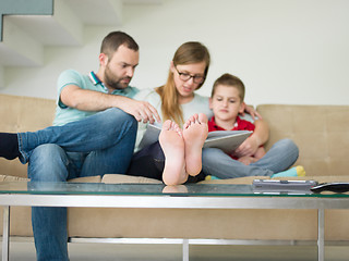 Image showing family with little boy enjoys in the modern living room