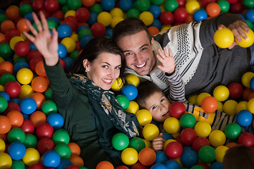 Image showing young parents with kids in a children\'s playroom