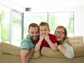 Image showing family with little boy enjoys in the modern living room