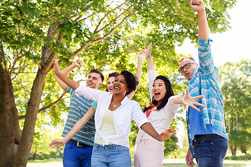 Image showing group of happy smiling friends having fun outdoors