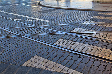 Image showing Old rail lines on cobbled road surface