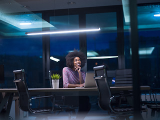 Image showing black businesswoman using a laptop in startup office