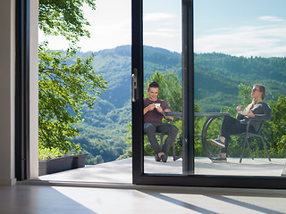 Image showing couple enjoying morning coffee and breakfast