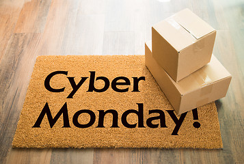 Image showing Cyber Monday Welcome Mat On Wood Floor With Shipment of Boxes