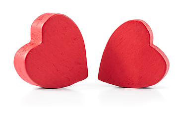 Image showing Two red wooden hearts isolated on white