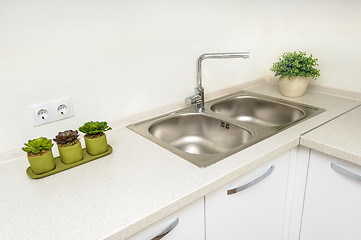 Image showing Modern white kitchen with sink