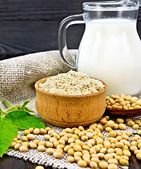 Image showing Flour soy in bowl with soybeans and milk on sacking