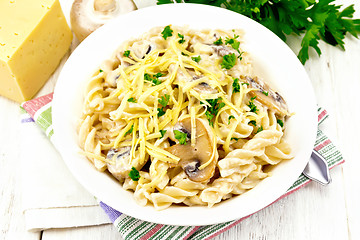 Image showing Fusilli with mushrooms on towel