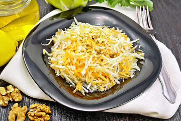 Image showing Salad of carrot and kohlrabi with honey in plate on board