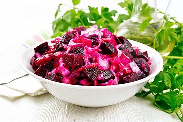 Image showing Vinaigrette with cabbage in bowl on light board