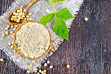 Image showing Flour soy in bowl with leaf on board top