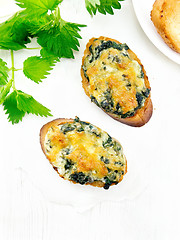 Image showing Sandwich of nettle and cheese on board top