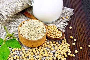 Image showing Flour soy in bowl with soybeans and milk on board