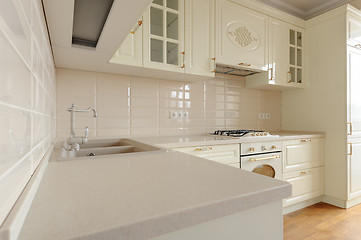 Image showing Classic cream colored kitchen closeup