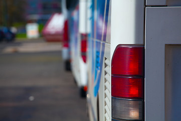 Image showing back view of bus, red side lamp