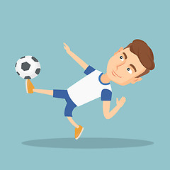 Image showing Soccer player kicking a ball vector illustration.