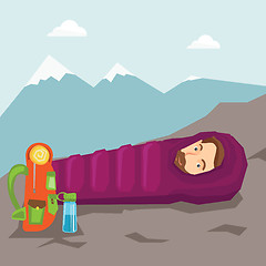 Image showing Man sleeping in sleeping bag in the mountains.