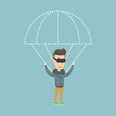 Image showing Happy man in vr headset flying with parachute.