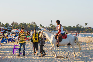 Image showing Malagasy beauty, beautiful girls ride horse