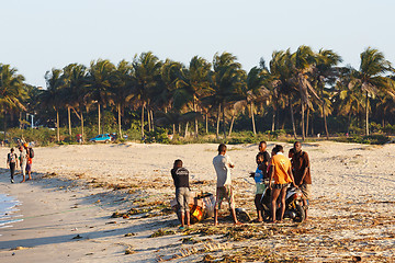 Image showing Malagasy peoples resting on the beach in harbor