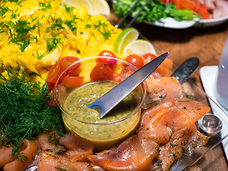 Image showing Scandinavian smorgasbord with gravlax and mustard sauce