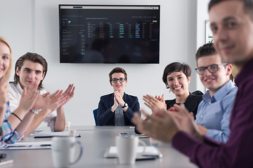 Image showing Group of young people meeting in startup office