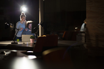 Image showing young designers in the night office