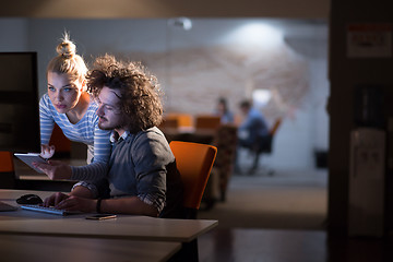 Image showing young designers in the night office