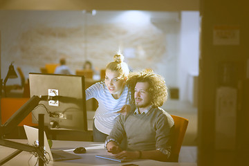 Image showing young designers in the night office