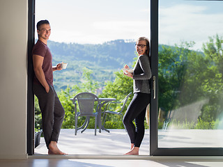 Image showing couple on the door of their luxury home villa