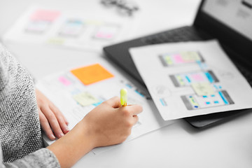 Image showing web designer working on user interface at office