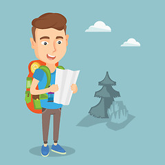 Image showing Traveler with backpack looking at map.