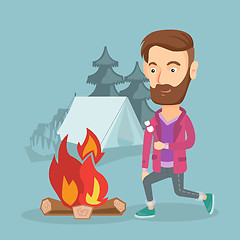 Image showing Businessman roasting marshmallow over campfire.