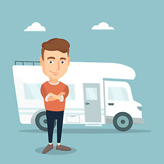 Image showing Man standing in front of motor home.