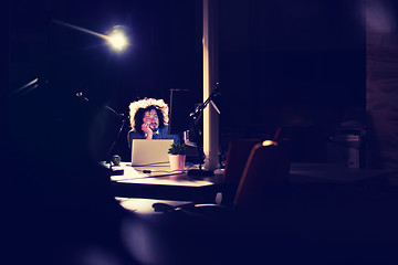 Image showing businessman relaxing at the desk