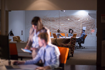 Image showing young designers in the night office