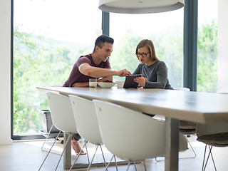 Image showing couple enjoying morning coffee and strawberries