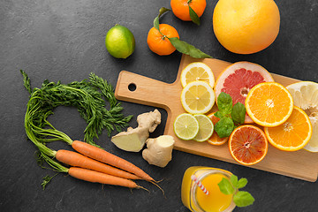 Image showing fruits, vegetables, cutting board and juice