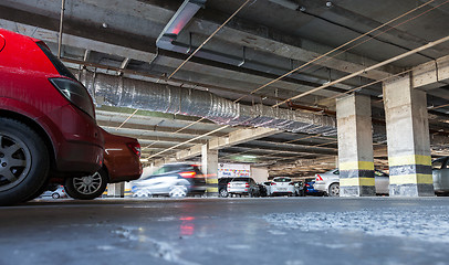 Image showing Different cars parked at the parking lot Aurora shopping mall