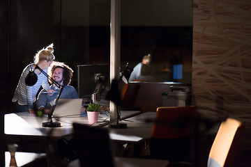 Image showing young designers in the night office