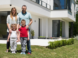 Image showing happy family with children in the yard