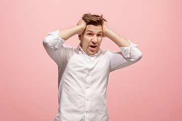 Image showing Handsome man in stress isolated on pink