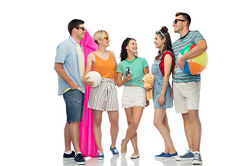 Image showing happy friends with beach and summer accessories