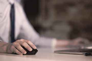 Image showing Hand using computer mouse closeup