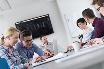 Image showing Two Business People Working With laptop in office