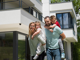 Image showing happy family with children in the yard